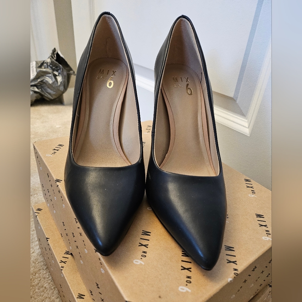 Black leather pumps